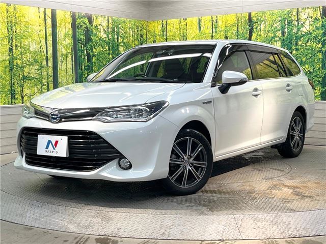 2015 Toyota Corolla Fielder Hybrid G Sedan for sale, Japanese used car export - photo 1 of 30 | GULJI TRADERS