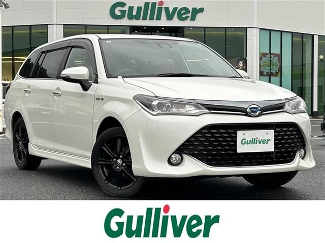 2015 Toyota Corolla Fielder Hybrid G Sedan for sale, Japanese used car export - photo 1 of 23 | GULJI TRADERS
