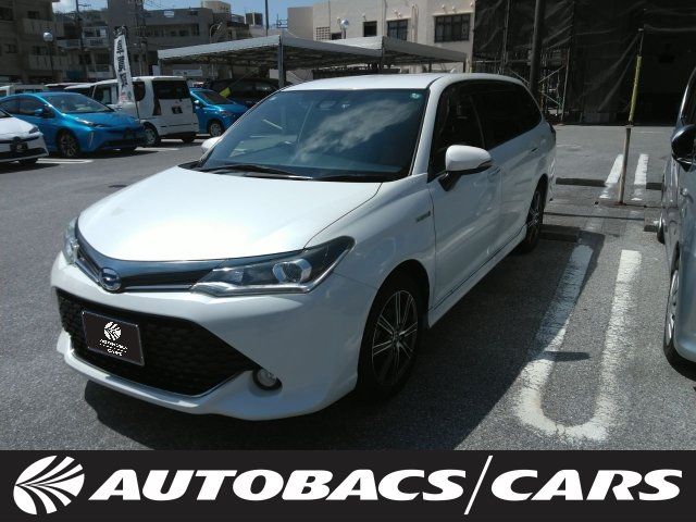 2015 Toyota Corolla Fielder 1500 Hybrid G FCVT 2WD - photo 1 2015 Toyota Corolla Fielder 1500 Hybrid G FCVT 2WD Sedan for sale, Japanese used car export - photo 1 of 3 | GULJI TRADERS