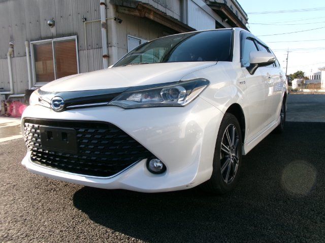 2015 Toyota Corolla Fielder Hybrid G WxB Sedan for sale, Japanese used car export - photo 1 of 24 | GULJI TRADERS