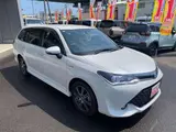2015 Toyota Corolla Fielder 1.5 Hybrid G ​​W×B Pearl Van for sale, Japanese used car export - photo 2 of 16 | GULJI TRADERS
