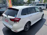 2015 Toyota Corolla Fielder 1.5 Hybrid G ​​W×B Pearl Van for sale, Japanese used car export - photo 13 of 16 | GULJI TRADERS