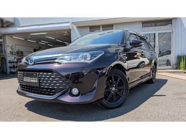 2015 Toyota Corolla Fielder Hybrid G - photo 1 2015 Toyota Corolla Fielder Hybrid G Sedan for sale, Japanese used car export - photo 1 of 23 | GULJI TRADERS