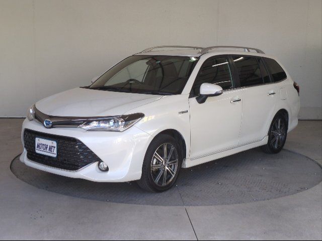 2015 Toyota Corolla Fielder Hybrid G WxB Sedan for sale, Japanese used car export - photo 1 of 11 | GULJI TRADERS