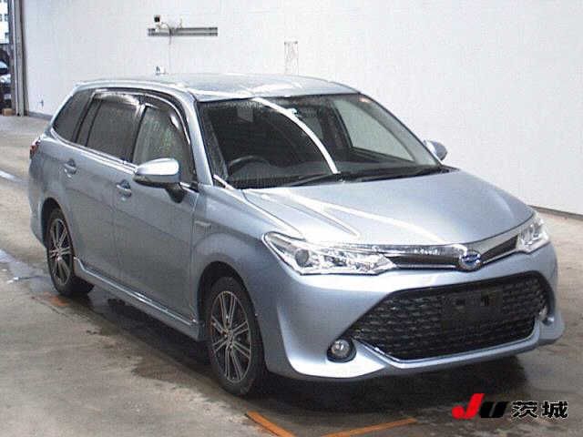 2015 Toyota Corolla Fielder Hybrid - photo 1 2015 Toyota Corolla Fielder Hybrid Sedan for sale, Japanese used car export - photo 1 of 8 | GULJI TRADERS