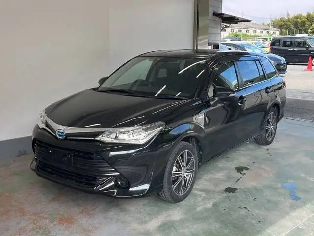 2016 Toyota Corolla Fielder Hybrid G - photo 1 2016 Toyota Corolla Fielder Hybrid G Black Van for sale, Japanese used car export - photo 1 of 8 | GULJI TRADERS