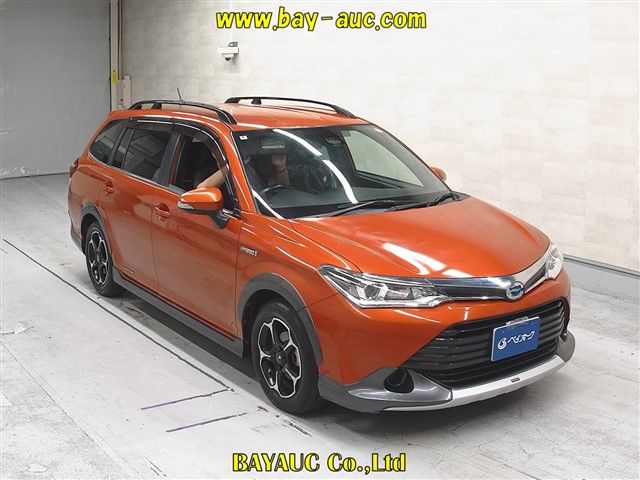 2016 Toyota Corolla Fielder Hybrid - photo 1 2016 Toyota Corolla Fielder Hybrid Sedan for sale, Japanese used car export - photo 1 of 6 | GULJI TRADERS