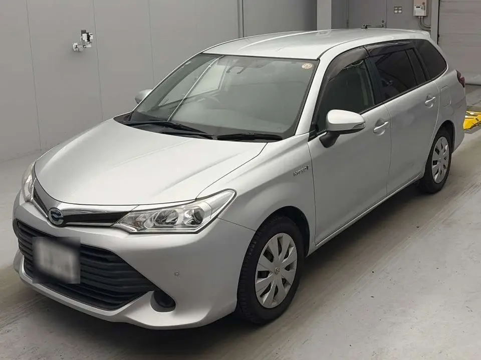 2016 Toyota Corolla Fielder hybrid - photo 1 2016 Toyota Corolla Fielder hybrid Silver Van for sale, Japanese used car export - photo 1 of 2 | GULJI TRADERS