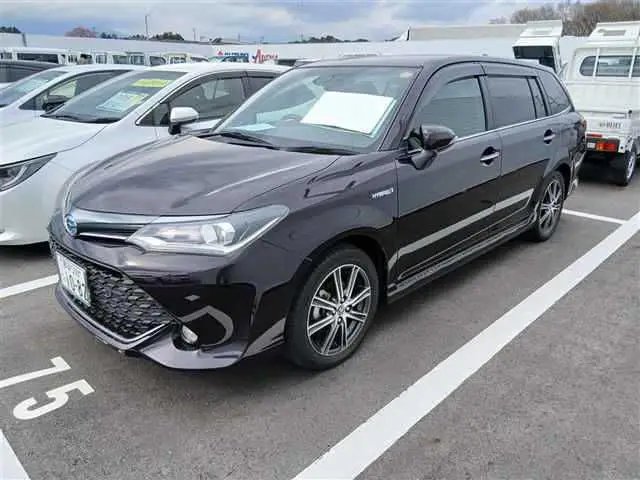 2016 Toyota Corolla Fielder Hybrid G ​​WxB Red Van for sale, Japanese used car export - photo 1 of 9 | GULJI TRADERS