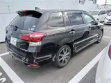2016 Toyota Corolla Fielder Hybrid G ​​WxB Red Van for sale, Japanese used car export - photo 2 of 9 | GULJI TRADERS