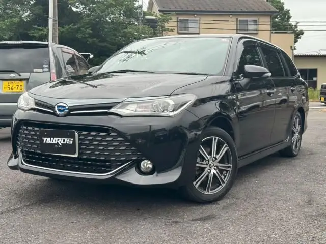 2016 Toyota Corolla Fielder Hybrid G Double By - photo 1 2016 Toyota Corolla Fielder Hybrid G Double By Black Van for sale, Japanese used car export - photo 1 of 9 | GULJI TRADERS