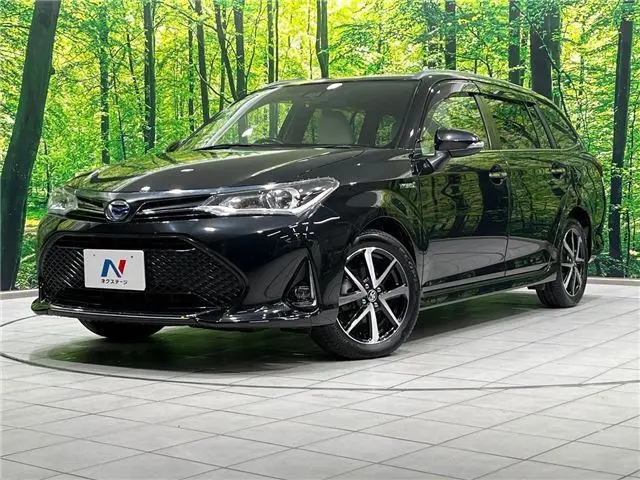 2017 Toyota Corolla Fielder Hybrid G Double By Bee - photo 1 2017 Toyota Corolla Fielder Hybrid G Double By Bee Black Van for sale, Japanese used car export - photo 1 of 30 | GULJI TRADERS