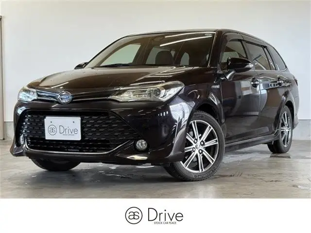 2017 Toyota Corolla Fielder 1.5 Hybrid GW×B - photo 1 2017 Toyota Corolla Fielder 1.5 Hybrid GW×B Purple Van for sale, Japanese used car export - photo 1 of 28 | GULJI TRADERS