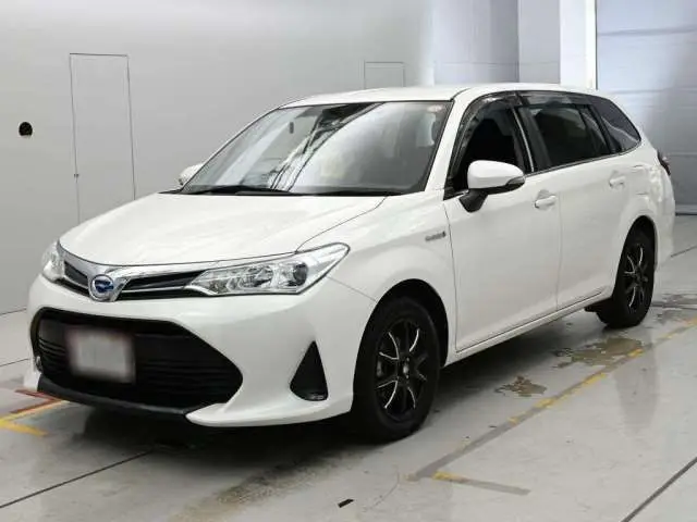 2017 Toyota Corolla Fielder Hybrid G - photo 1 2017 Toyota Corolla Fielder Hybrid G Pearl Van for sale, Japanese used car export - photo 1 of 12 | GULJI TRADERS