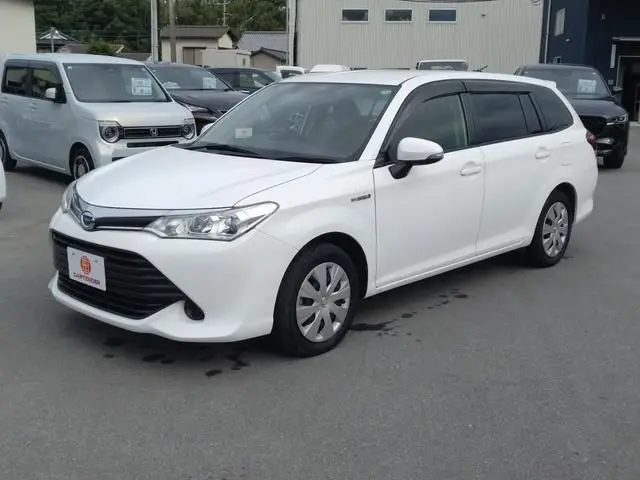 2017 Toyota Corolla Fielder hybrid - photo 1 2017 Toyota Corolla Fielder hybrid White Van for sale, Japanese used car export - photo 1 of 9 | GULJI TRADERS