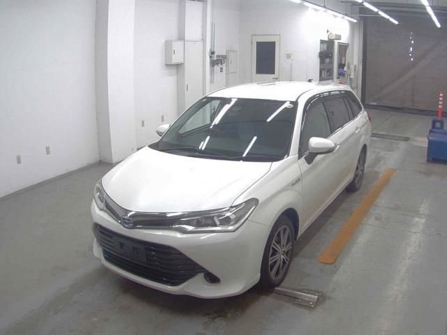 2017 Toyota Corolla Fielder Hybrid G - photo 1 2017 Toyota Corolla Fielder Hybrid G Sedan for sale, Japanese used car export - photo 1 of 6 | GULJI TRADERS