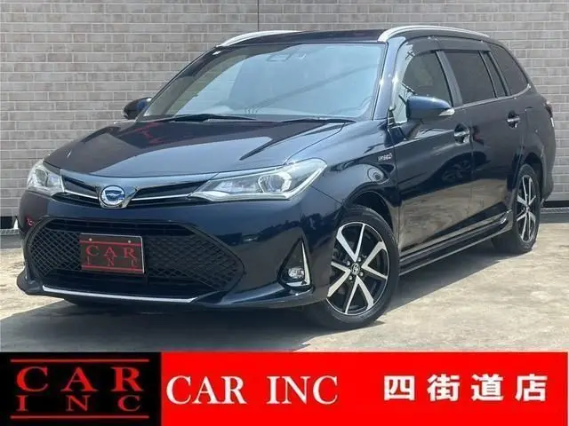 2018 Toyota Corolla Fielder Hybrid G ​​Double By Blue Van for sale, Japanese used car export - photo 1 of 9 | GULJI TRADERS