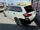 2019 Toyota Corolla Fielder hybrid Green Painted Van for sale, Japanese used car export - photo 7 of 49 | GULJI TRADERS