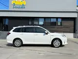 2019 Toyota Corolla Fielder hybrid White Van for sale, Japanese used car export - photo 4 of 19 | GULJI TRADERS
