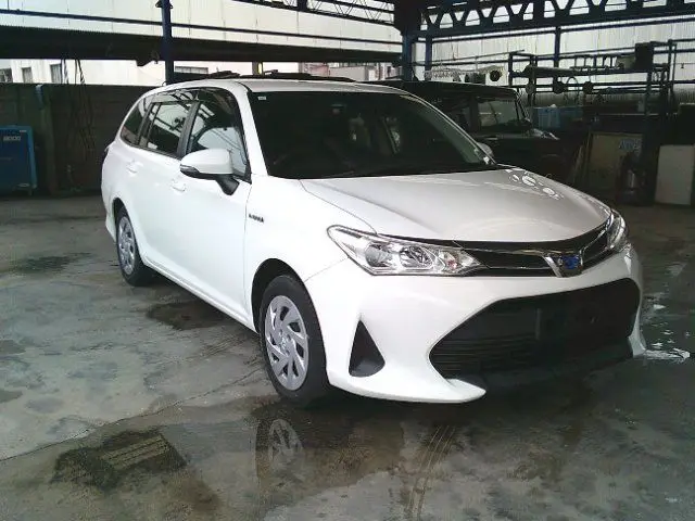 2019 Toyota Corolla Fielder hybrid - photo 1 2019 Toyota Corolla Fielder hybrid White Van for sale, Japanese used car export - photo 1 of 16 | GULJI TRADERS