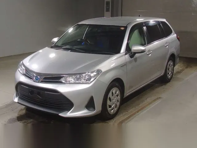 2019 Toyota Corolla Fielder Hybrid - photo 1 2019 Toyota Corolla Fielder Hybrid Silver Sedan for sale, Japanese used car export | GULJI TRADERS