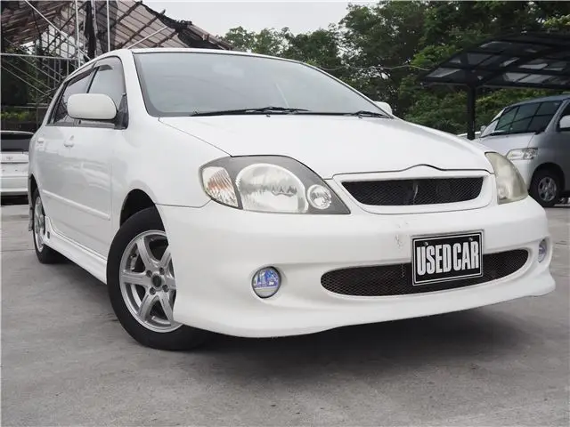 2001 Toyota Corolla Runx Z White Sedan for sale, Japanese used car export - photo 1 of 38 | GULJI TRADERS