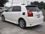 2001 Toyota Corolla Runx Z White Sedan for sale, Japanese used car export - photo 2 of 38 | GULJI TRADERS