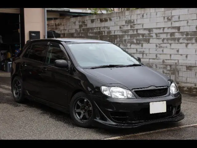 2001 Toyota Corolla Runx Z Aero Tourer - photo 1 2001 Toyota Corolla Runx Z Aero Tourer Black Sedan for sale, Japanese used car export - photo 1 of 24 | GULJI TRADERS