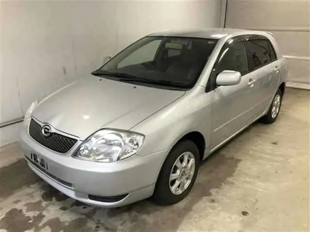 2002 Toyota Corolla Runx 4WD X LTD - photo 1 2002 Toyota Corolla Runx 4WD X LTD Silver Sedan for sale, Japanese used car export - photo 1 of 4 | GULJI TRADERS