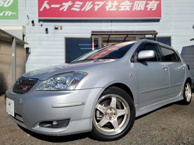 2003 Toyota Corolla Runx 1.8 TRD Sport M - photo 1 2003 Toyota Corolla Runx 1.8 TRD Sport M Silver Sedan for sale, Japanese used car export | GULJI TRADERS