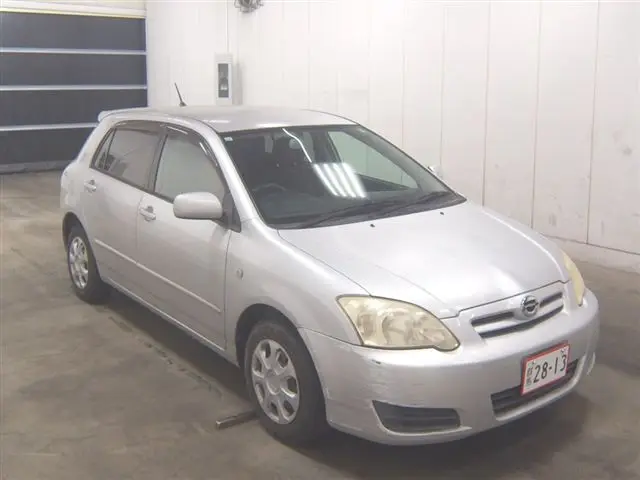 2005 Toyota Corolla Runx X - photo 1 2005 Toyota Corolla Runx X Silver Sedan for sale, Japanese used car export | GULJI TRADERS