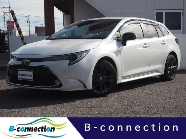 2019 Toyota Corolla Touring Hybrid 4WD Van for sale, Japanese used car export - photo 1 of 76 | GULJI TRADERS