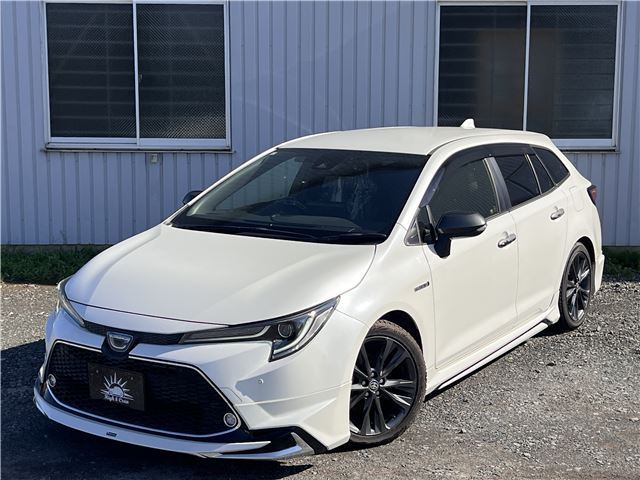 2019 Toyota Corolla Touring Hybrid Van for sale, Japanese used car export - photo 1 of 66 | GULJI TRADERS