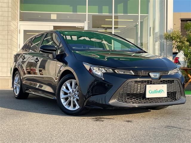 2019 Toyota Corolla Touring Hybrid S - photo 1 2019 Toyota Corolla Touring Hybrid S Van for sale, Japanese used car export - photo 1 of 24 | GULJI TRADERS