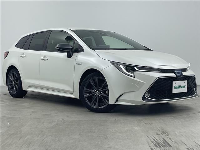 2019 Toyota Corolla Touring Hybrid - photo 1 2019 Toyota Corolla Touring Hybrid Van for sale, Japanese used car export - photo 1 of 24 | GULJI TRADERS