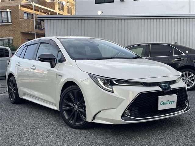 2019 Toyota Corolla Touring Hybrid Van for sale, Japanese used car export - photo 1 of 24 | GULJI TRADERS
