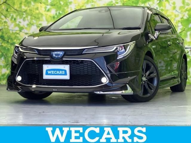 2019 Toyota Corolla Touring 4WD Hybrid - photo 1 2019 Toyota Corolla Touring 4WD Hybrid Van for sale, Japanese used car export - photo 1 of 9 | GULJI TRADERS