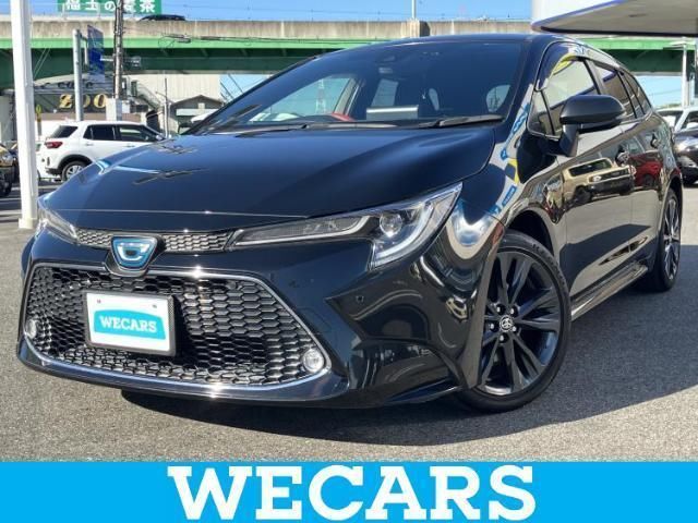 2019 Toyota Corolla Touring Hybrid - photo 1 2019 Toyota Corolla Touring Hybrid Van for sale, Japanese used car export - photo 1 of 9 | GULJI TRADERS