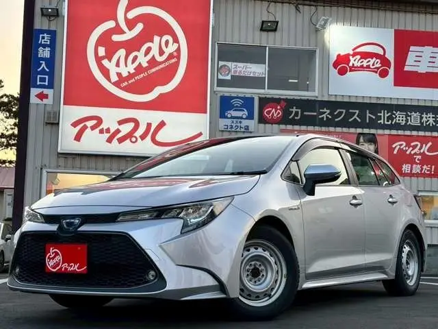 2020 Toyota Corolla Touring 1.8 Hybrid GX E-Four 4WD - photo 1 2020 Toyota Corolla Touring 1.8 Hybrid GX E-Four 4WD Silver Van for sale, Japanese used car export - photo 1 of 44 | GULJI TRADERS