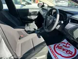 2020 Toyota Corolla Touring 1.8 Hybrid GX E-Four 4WD Silver Van for sale, Japanese used car export - photo 21 of 44 | GULJI TRADERS