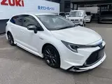 2020 Toyota Corolla Touring 1.8 Hybrid WxB E-Four 4WD Pearl Van for sale, Japanese used car export - photo 2 of 51 | GULJI TRADERS