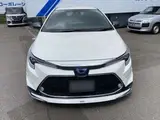 2020 Toyota Corolla Touring 1.8 Hybrid WxB E-Four 4WD Pearl Van for sale, Japanese used car export - photo 3 of 51 | GULJI TRADERS