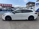 2020 Toyota Corolla Touring 1.8 Hybrid WxB E-Four 4WD Pearl Van for sale, Japanese used car export - photo 5 of 51 | GULJI TRADERS