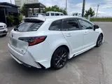 2020 Toyota Corolla Touring 1.8 Hybrid WxB E-Four 4WD Pearl Van for sale, Japanese used car export - photo 6 of 51 | GULJI TRADERS
