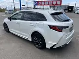2020 Toyota Corolla Touring 1.8 Hybrid WxB E-Four 4WD Pearl Van for sale, Japanese used car export - photo 7 of 51 | GULJI TRADERS