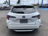 2020 Toyota Corolla Touring 1.8 Hybrid WxB E-Four 4WD Pearl Van for sale, Japanese used car export - photo 8 of 51 | GULJI TRADERS