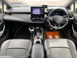 2020 Toyota Corolla Touring 1.8 Hybrid WxB E-Four 4WD Pearl Van for sale, Japanese used car export - photo 12 of 51 | GULJI TRADERS