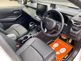 2020 Toyota Corolla Touring 1.8 Hybrid WxB E-Four 4WD Pearl Van for sale, Japanese used car export - photo 14 of 51 | GULJI TRADERS