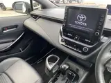 2020 Toyota Corolla Touring 1.8 Hybrid WxB E-Four 4WD Pearl Van for sale, Japanese used car export - photo 19 of 51 | GULJI TRADERS