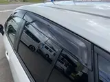 2020 Toyota Corolla Touring 1.8 Hybrid WxB E-Four 4WD Pearl Van for sale, Japanese used car export - photo 40 of 51 | GULJI TRADERS